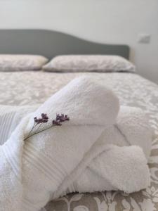 Katil atau katil-katil dalam bilik di Casa Camelia - appartamento in centro a Seregno