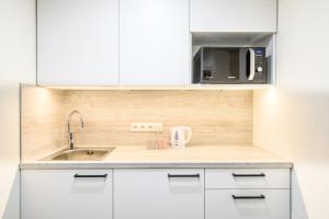 Kuchyň nebo kuchyňský kout v ubytování Stay to Stay Apartments - võtmeta sissepääs
