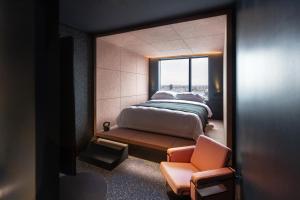 Ein Bett oder Betten in einem Zimmer der Unterkunft Zonar Zagreb by Maistra City Vibes