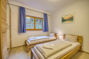 Ένα ή περισσότερα κρεβάτια σε δωμάτιο στο Select Top 7 - by Alpen Apartments +23 φωτογραφίες