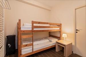 Postel nebo postele na pokoji v ubytování Flat Marthe