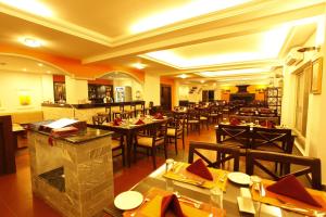 Restorāns vai citas vietas, kur ieturēt maltīti, naktsmītnē Waterfront Resort by KGH Group