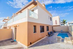 a view of a house with a swimming pool at 3083 Casa Nueve in San Pedro del Pinatar