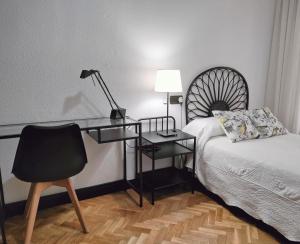 Posteľ alebo postele v izbe v ubytovaní Vivienda con Parking incluido - Zona Van Dyck