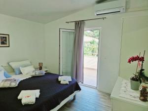 Postel nebo postele na pokoji v ubytování Guest House Antonia