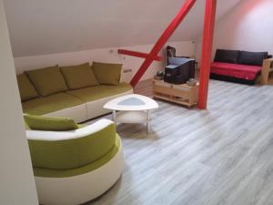 Posezení v ubytování LINDENHOF WALDHEIM