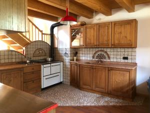 Kuchyň nebo kuchyňský kout v ubytování Maso Nembia