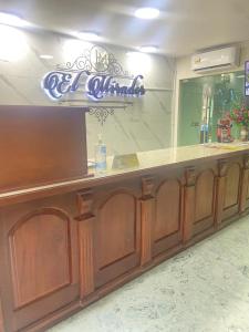 a counter in a restaurant with a sign above it at Hotel El Mirador in Ciudad Valles