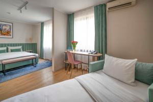Posteľ alebo postele v izbe v ubytovaní Hotel H12**** + 37 fotografií