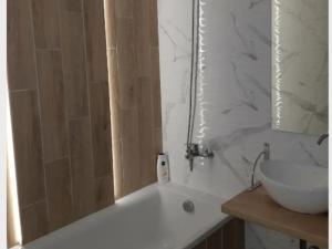 Koupelna v ubytování Затишна квартира біля автовокзалу та неподалік центру