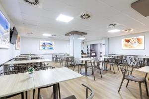 TV a/nebo společenská místnost v ubytování Sweet Hotel Renasa