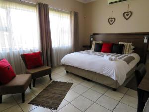 Andante Guesthouse Klerksdorp客房内的一张或多张床位