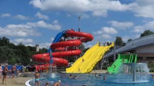 a group of people playing in a water park at Villa Beata in Radvánovice
