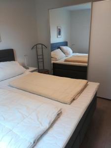 Llit o llits en una habitació de Hoern-17-4-Scharbeutz