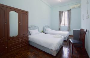 เตียงในห้องที่ Hin Loi Guesthouse