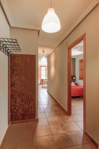 Łóżko lub łóżka w pokoju w obiekcie Barranco de la Olla by Apartamentos Arnedillo