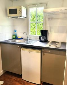 Afbeelding uit fotogalerij van Camping Paris Beau Village in Villiers-sur-Orge +46 foto's