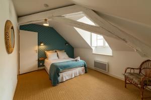 Llit o llits en una habitació de Happy Cocoon - Immersion au centre historique