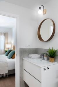 Posteľ alebo postele v izbe v ubytovaní Magno Apartments Castelar