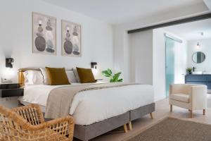 Posteľ alebo postele v izbe v ubytovaní Magno Apartments Castelar
