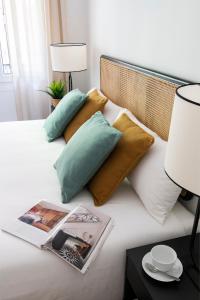 Posteľ alebo postele v izbe v ubytovaní Magno Apartments Castelar