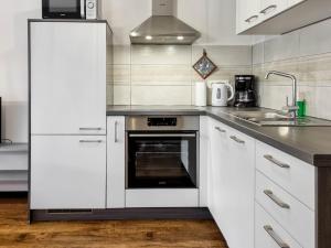 Kuchyň nebo kuchyňský kout v ubytování Apartmaji Jakob 1