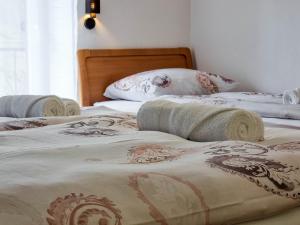 Postel nebo postele na pokoji v ubytování Apartmaji Jakob 1