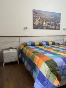 Ένα ή περισσότερα κρεβάτια σε δωμάτιο στο Hotel cappuccetto rosso