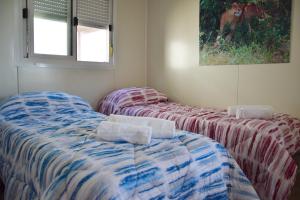 Postel nebo postele na pokoji v ubytování SAFARI CAMPING