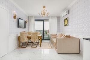 Posezení v ubytování Prestiżowe Apartamenty Natural Darłówko by Noclegi Renters