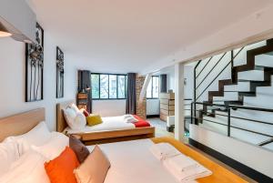 Ένα ή περισσότερα κρεβάτια σε δωμάτιο στο Sweett - Tardieu