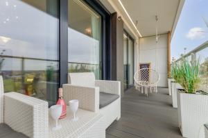 Balkón nebo terasa v ubytování Prestiżowe Apartamenty Natural Darłówko by Noclegi Renters