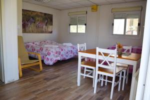 Postel nebo postele na pokoji v ubytování SAFARI CAMPING