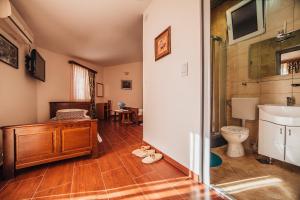 a bathroom with a sink and a toilet in a room at Guest house Šebelj in Budva +67 photos