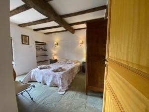 Säng eller sängar i ett rum på Borgo Village