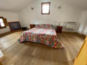 Cama ou camas em um quarto em Borgo Village