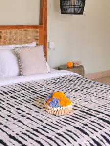 Ein Bett oder Betten in einem Zimmer der Unterkunft Villa Casa Orana