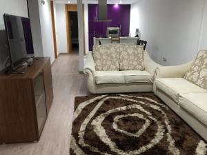 TV a/nebo společenská místnost v ubytování TENERIFE PARADISE Costa Adeje