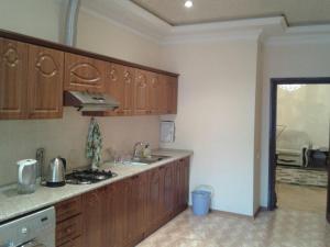 A kitchen or kitchenette at Apartment on Fuad Ibrahimbeyov