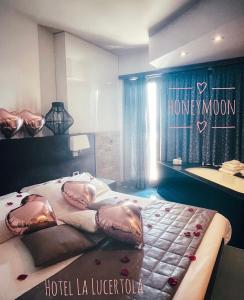 Postel nebo postele na pokoji v ubytování Hotel La Lucertola