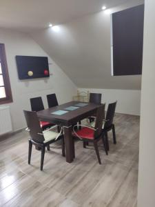 Telewizja i/lub zestaw kina domowego w obiekcie Casa da Escuela