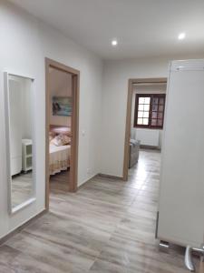 Łóżko lub łóżka w pokoju w obiekcie Casa da Escuela
