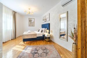 Una cama o camas en una habitación de Luxury apartmens Sebastijan&Karlo