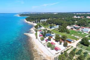 an aerial view of the shoreline of a resort at Mobile home Kastanjola in Biograd na Moru