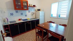 Kuchyň nebo kuchyňský kout v ubytování Apartment Zlatko