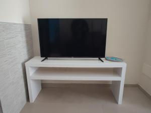 TV a/nebo společenská místnost v ubytování Appartamento via giansanti