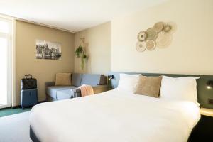 Postel nebo postele na pokoji v ubytování Green Park Hotel Brugge