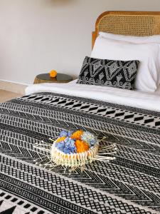 Ein Bett oder Betten in einem Zimmer der Unterkunft Villa Casa Orana