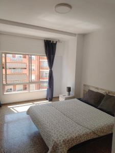 En eller flere senge i et værelse på City Centre apartments