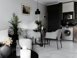 Kuchyň nebo kuchyňský kout v ubytování Royal on 81 Ventura